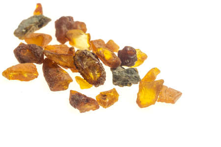 golden amber on a white isolated backgroundの写真素材
