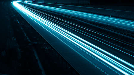 blue car lights at night. long exposureの写真素材