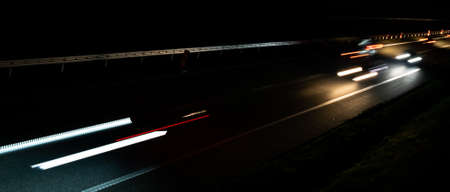 lights of moving cars at night. long exposureの写真素材