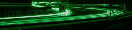 green car lights at night. long exposureの写真素材