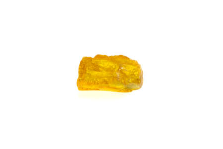 golden amber on a white isolated backgroundの写真素材