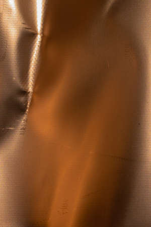 sheet metal painted a copper color. background or texture
