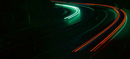 lights of moving cars at night. long exposure