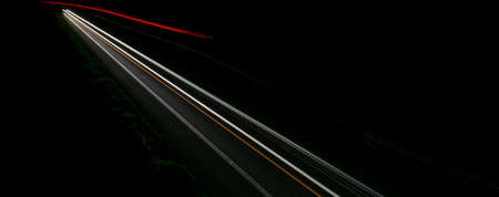lights of moving cars at night. long exposure