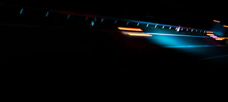 lights of moving cars at night. long exposure