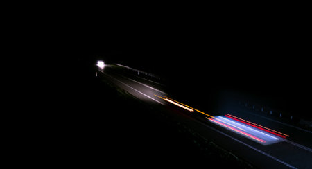 abstract red car lights at night. long exposureの写真素材