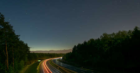 lights of moving cars at night. long exposureの写真素材