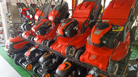 Swierklaniec, Poland - March 10, 2021 - Husqvarna petrol lawn mowers in redのeditorial素材