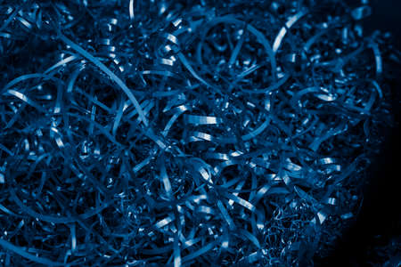 blue steel shavings with visible details. background or textureの写真素材
