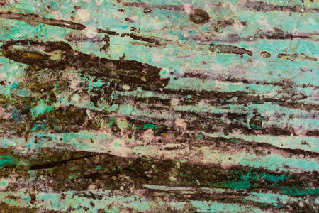 copper plate covered with a blue patinaの写真素材
