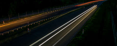 lights of moving cars at night. long exposureの写真素材
