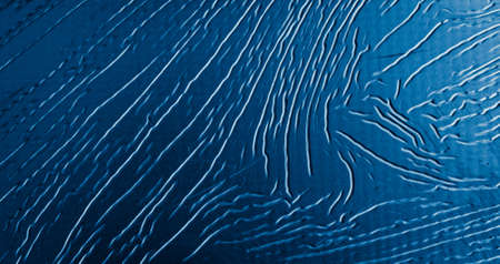 sheet metal painted blue with an interesting patternの写真素材