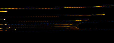 colored lines on a black background. texturaの写真素材