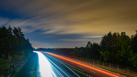 lights of moving cars at night. long exposureの写真素材