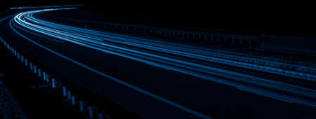 blue car lights at night. long exposureの写真素材
