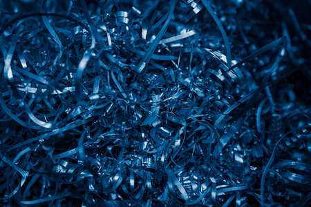 blue steel shavings with visible details. background or textureの写真素材