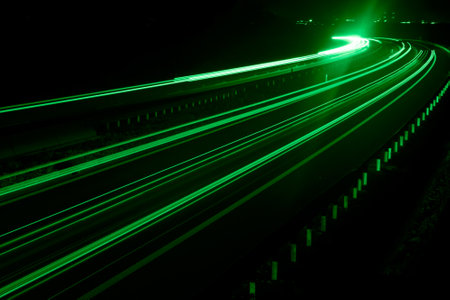 green car lights at night. long exposureの写真素材