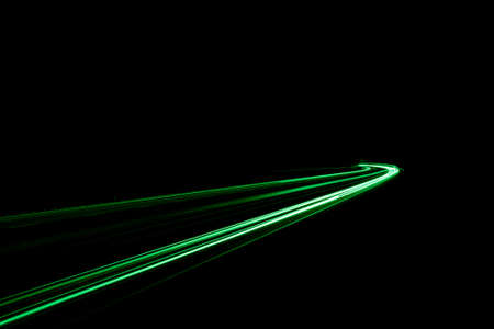green car lights at night. long exposureの写真素材