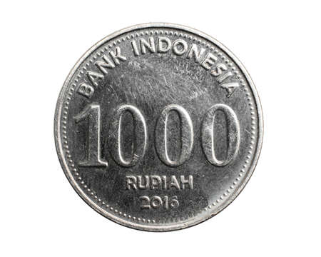 Indonesia a thousand rupiah coin on a white isolated backgroundの写真素材