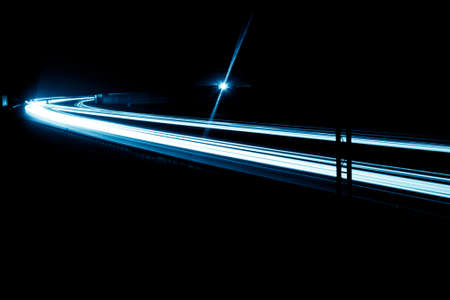 blue car lights at night. long exposureの写真素材