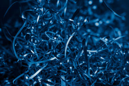 blue steel shavings with visible details. background or textureの写真素材