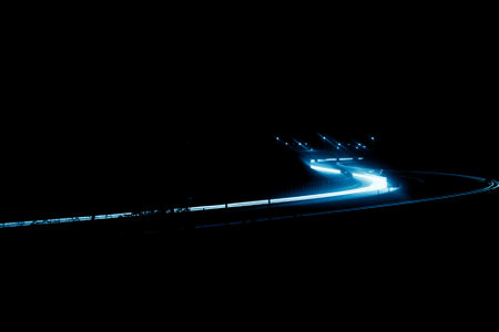 blue car lights at night. long exposureの写真素材