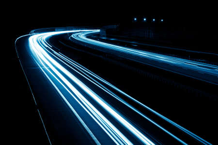 blue car lights at night. long exposureの写真素材