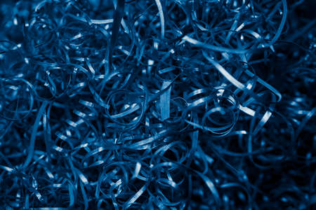 blue steel shavings with visible details. background or textureの写真素材