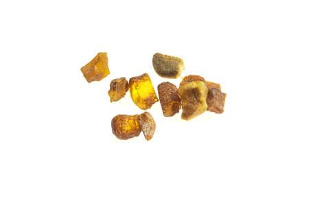 golden amber on a white isolated backgroundの写真素材