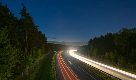 lights of moving cars at night. long exposureの写真素材