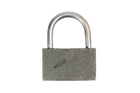 old padlock on a white isolated backgroundの写真素材