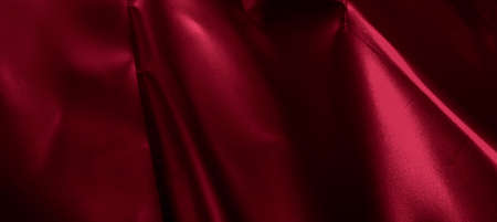 red crinkle foil with visible texture. backgroundの写真素材