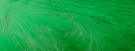 sheet metal painted green with an interesting patternの写真素材
