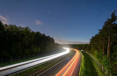lights of moving cars at night. long exposureの写真素材