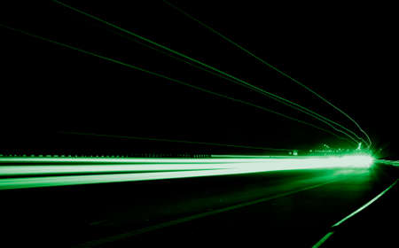 green car lights at night. long exposureの写真素材