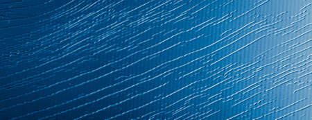 sheet metal painted blue with an interesting patternの写真素材