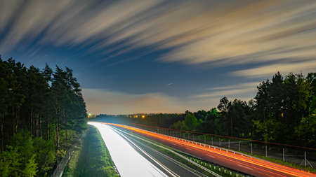lights of moving cars at night. long exposureの写真素材
