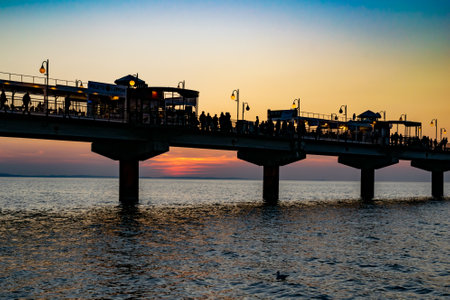 pier against the backdrop of a nice sunset skyの写真素材
