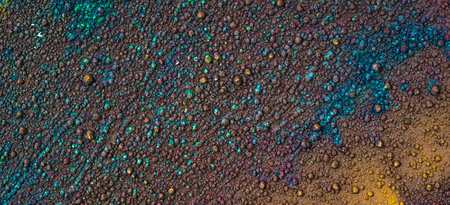 a colored piece of copper with a visible textureの写真素材