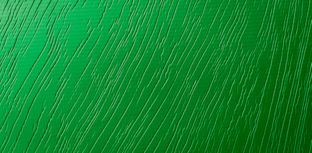 sheet metal painted green with an interesting patternの写真素材