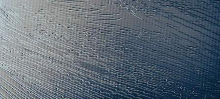 sheet metal painted blue with an interesting patternの写真素材