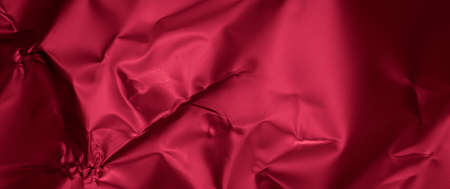 steel sheet painted with red paint. background or textureの写真素材