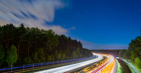 lights of moving cars at night. long exposureの写真素材
