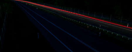 lights of moving cars at night. long exposureの写真素材