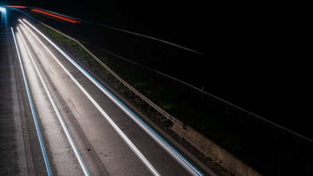 lights of moving cars at night. long exposureの写真素材