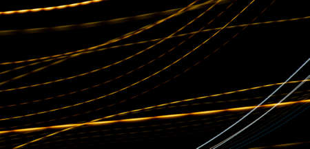 colored lines on a black background. texturaの写真素材