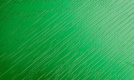 sheet metal painted green with an interesting patternの写真素材