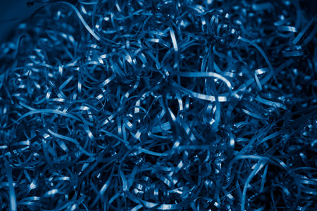 blue steel shavings with visible details. background or textureの写真素材