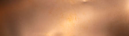 sheet metal painted a copper color. background or textureの写真素材