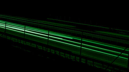 green car lights at night. long exposureの写真素材